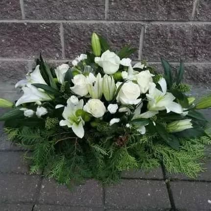 Flower arrangement of lilies, roses, eustoma
