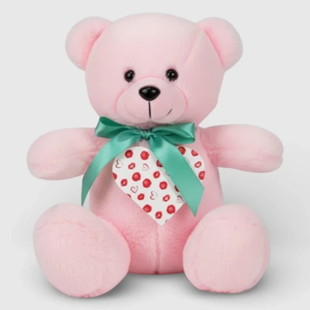 Soft toy teddy bear with heart, pink
