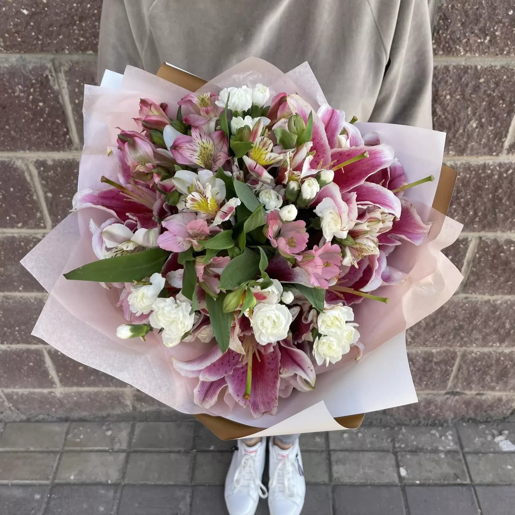 Bouquet of pink lilies, carnations and alstroemerias
