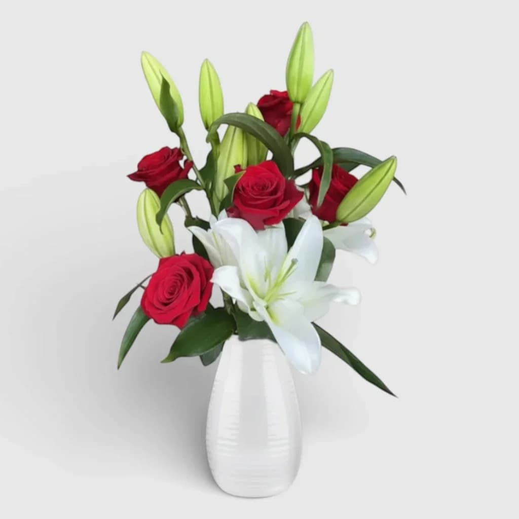 Bouquet of 5 red roses and 2 white lilies
