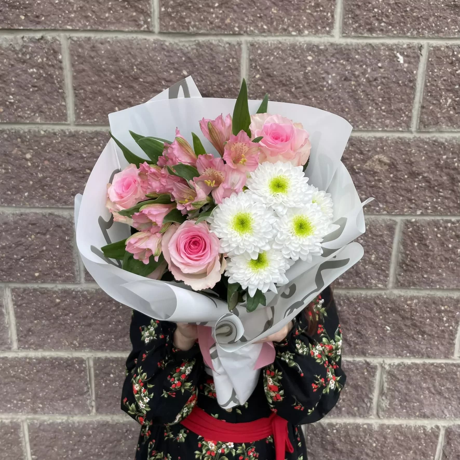 Mix bouquet of chrysanthemums, alstroemeria and roses