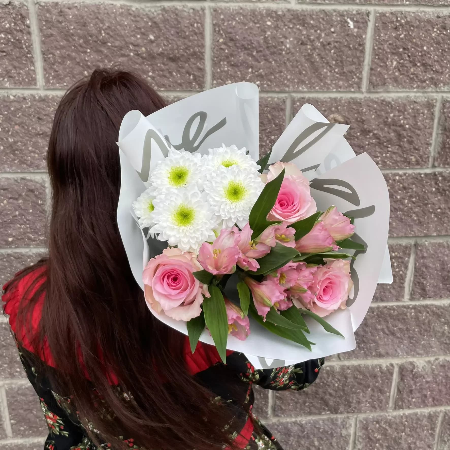 Mix bouquet of chrysanthemums, alstroemeria and roses
