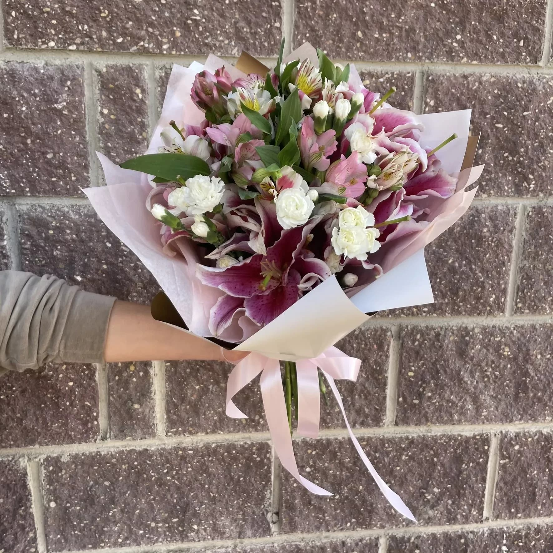 Bouquet of pink lilies, carnations and alstroemerias