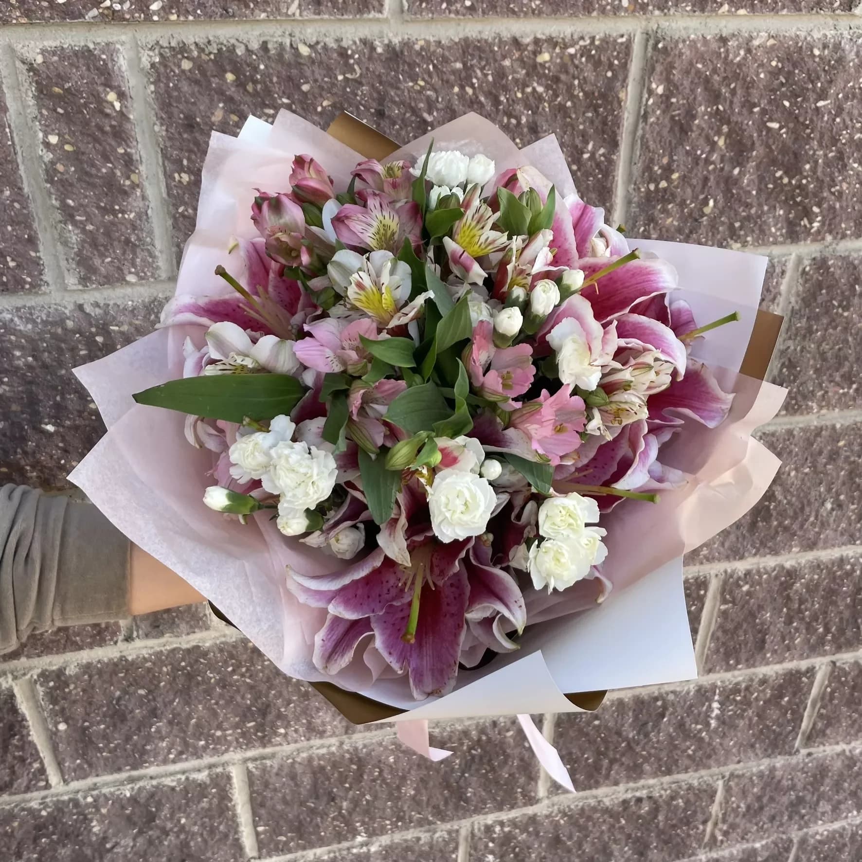 Bouquet of pink lilies, carnations and alstroemerias