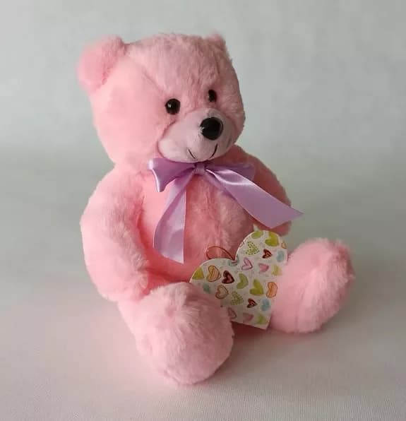 Teddy bear and a bouquet of flowers