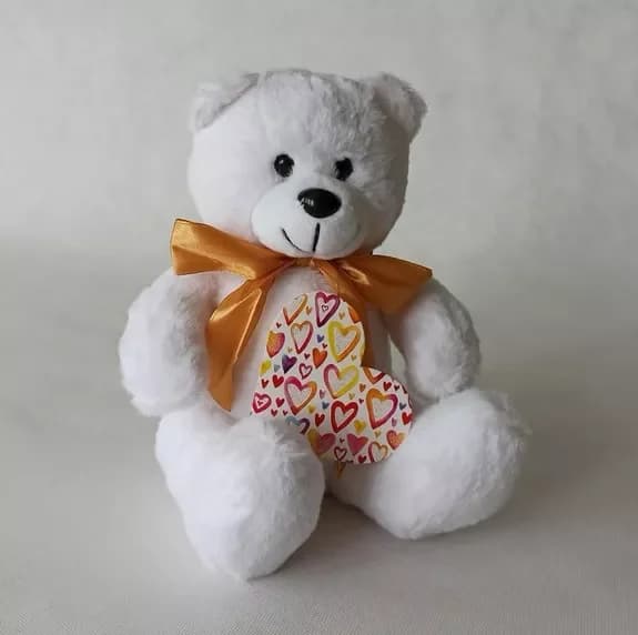 Teddy bear and a bouquet of flowers